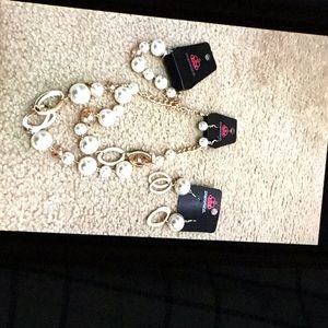 Woman necklaces earrings bracelets